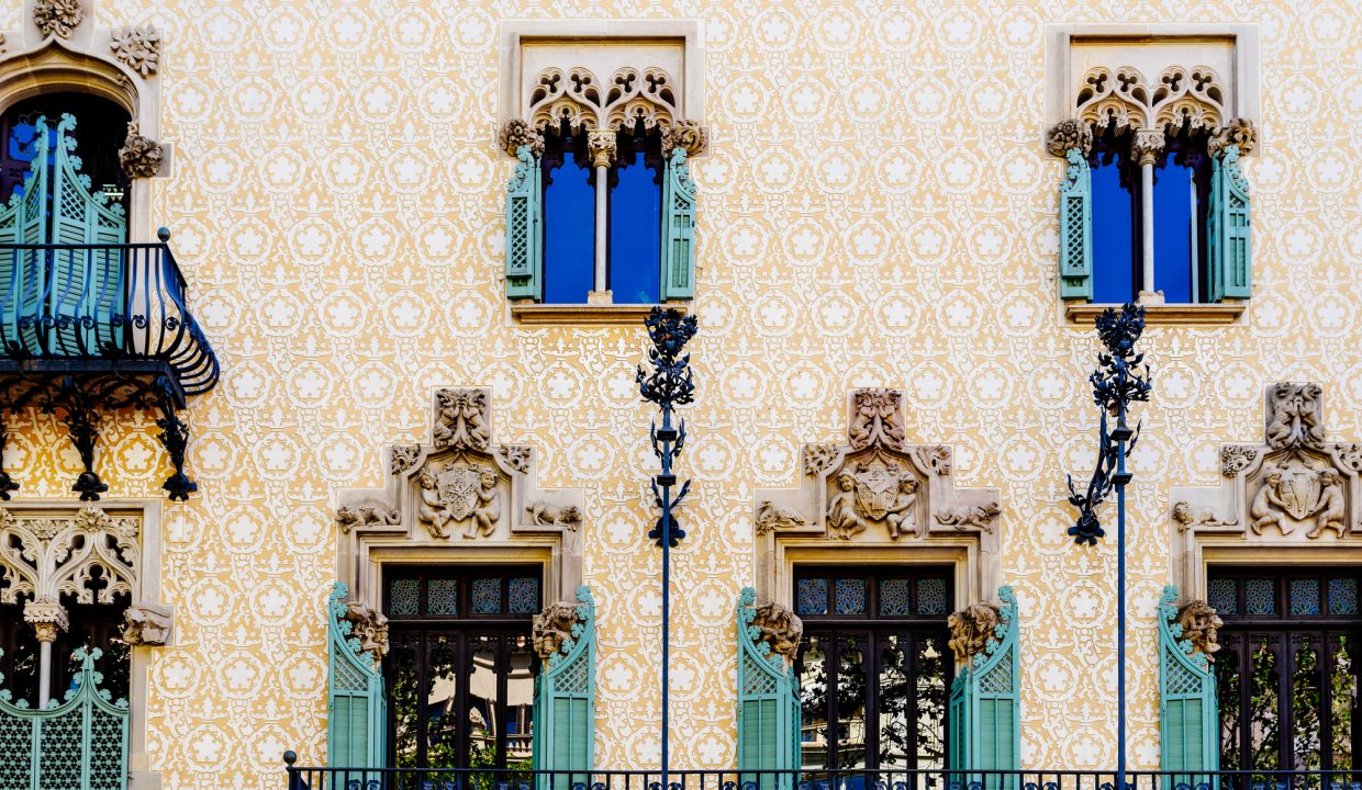 Apartment Building Block Exterior Facade In Barcelona, Spain.
